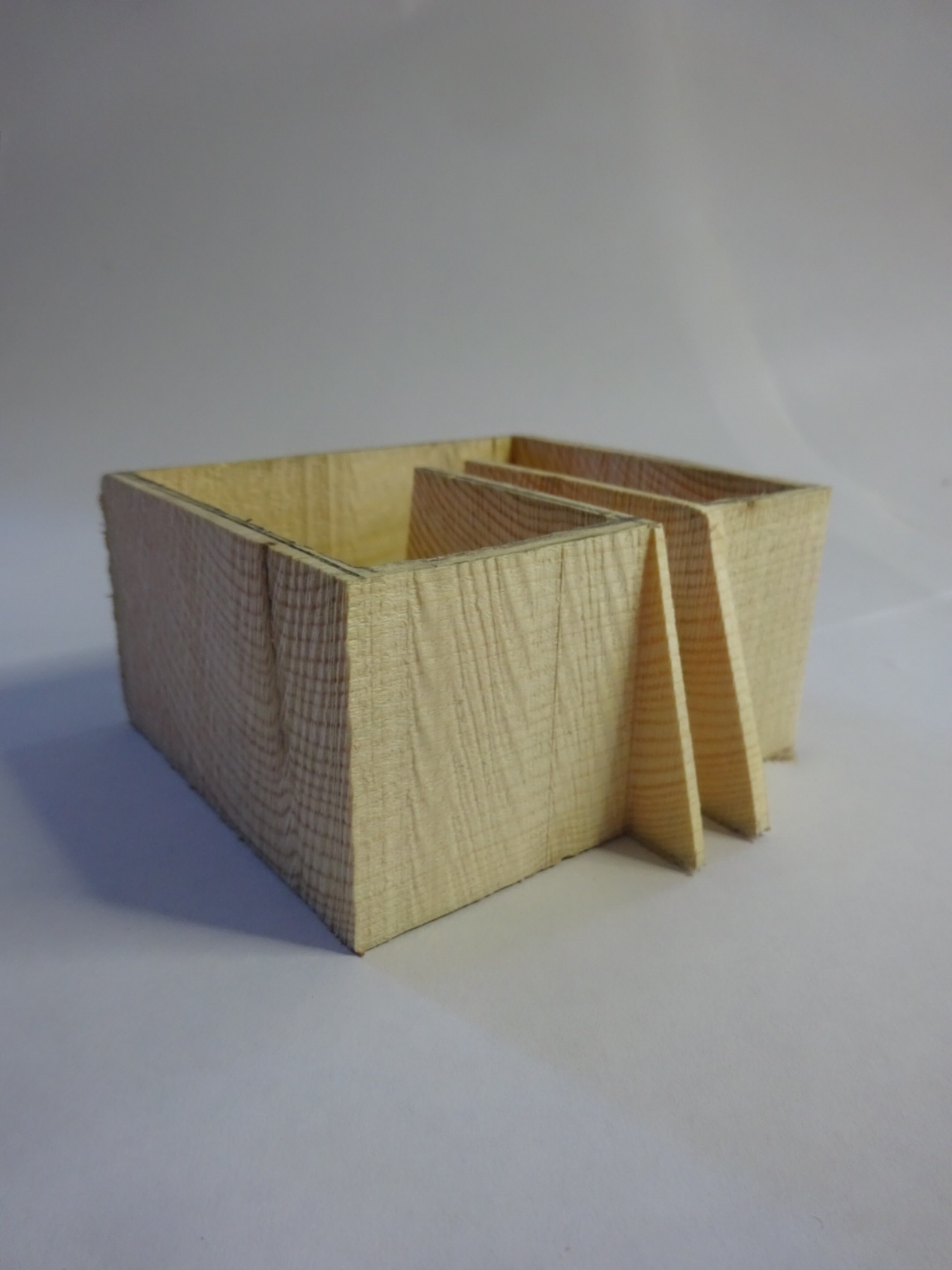 Square building with useless internal corridor. 