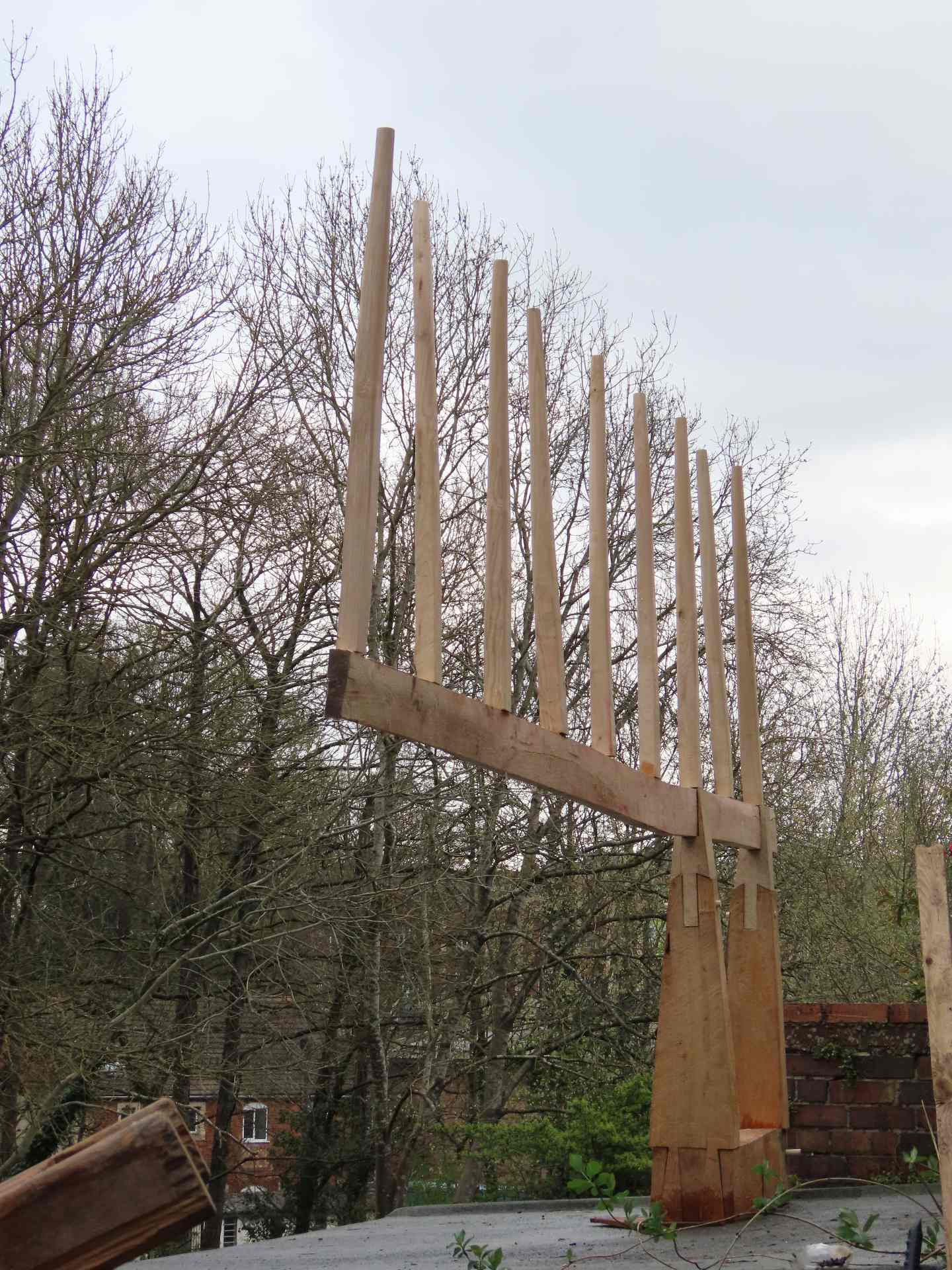 A dramatic view of Railing, its tines aligned with distant branches.