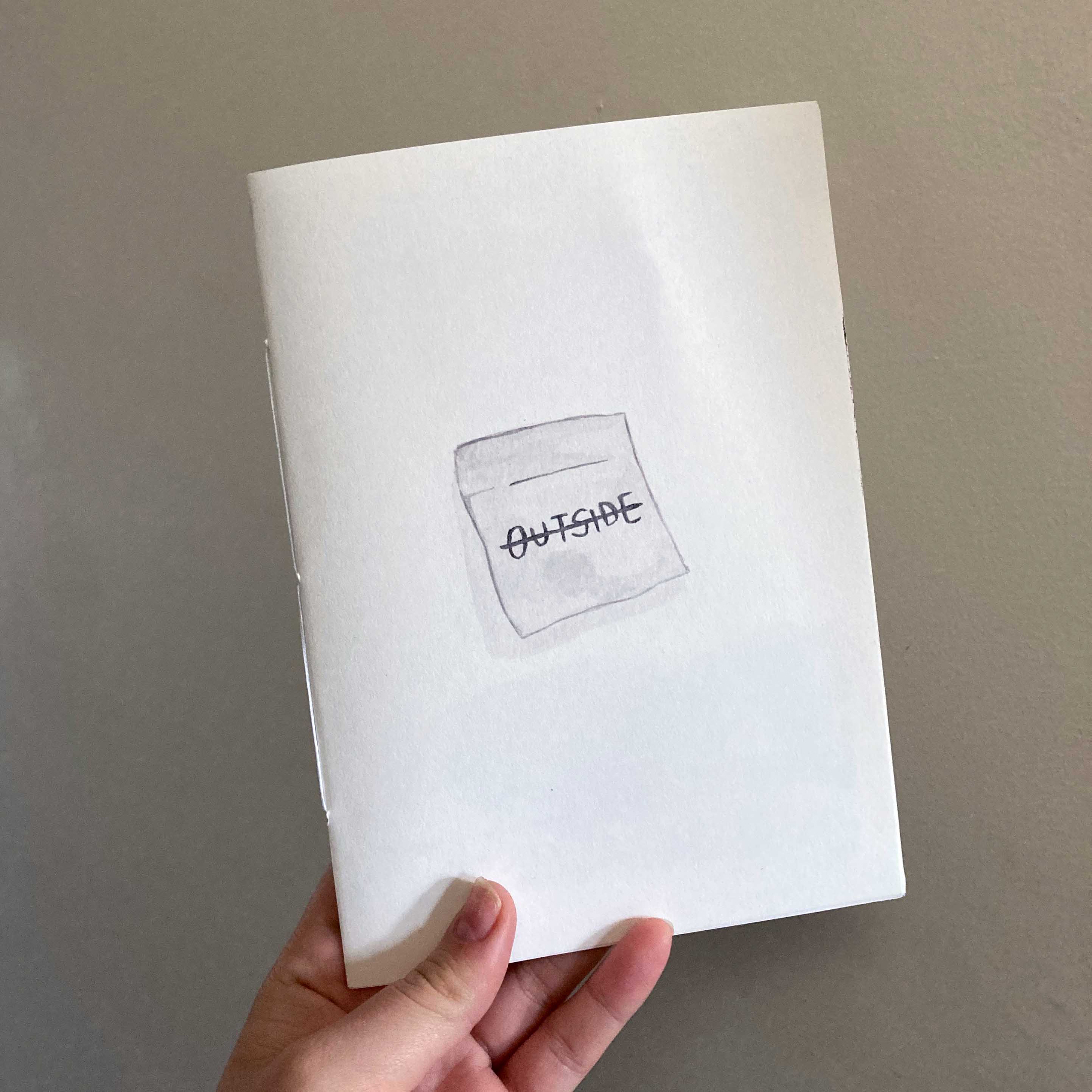 'OUTSIDE' comic cover page showing postit note with the word 'OUTSIDE' scored out.