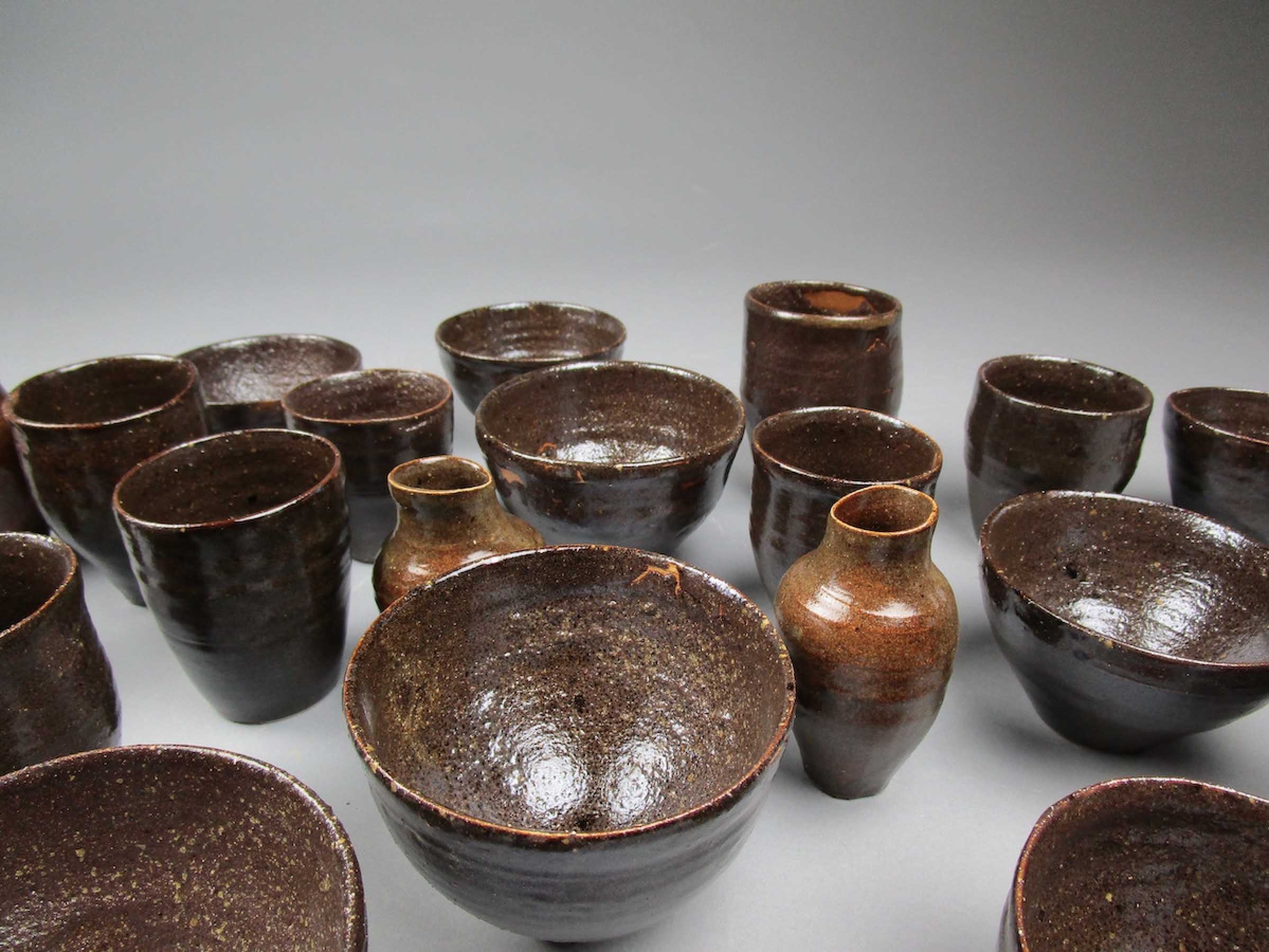 Details of the brown and green glazed pots.