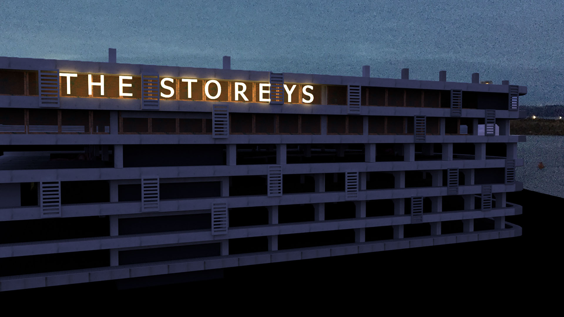 A visual looking at the exterior of the multi storey carpark from the top looking down. Included is signage spelling out 'THE STOREYS'