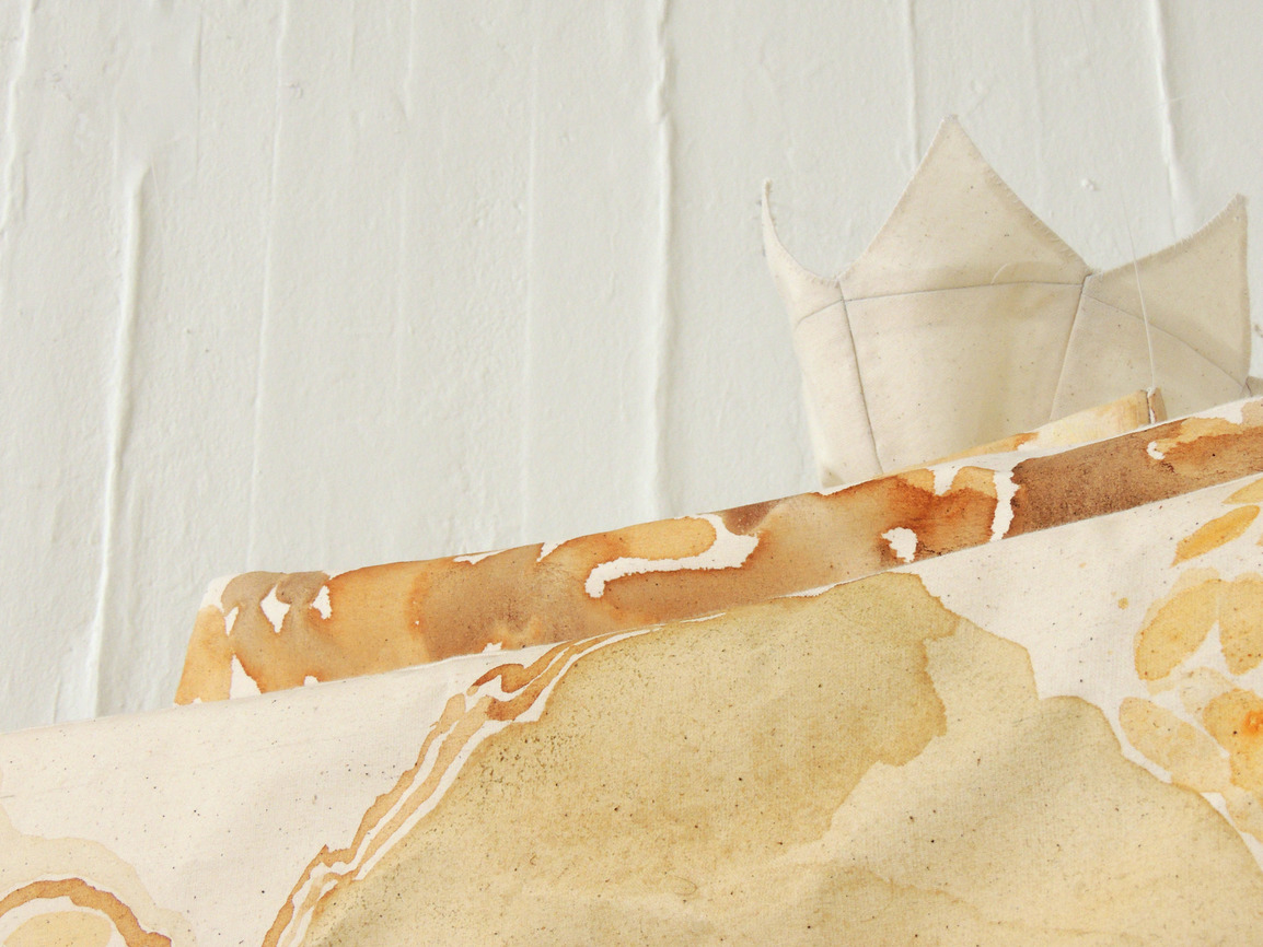 Close-up of Crown of painting installation.