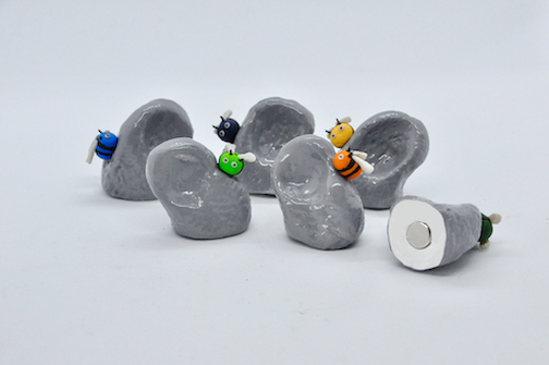 All playing pieces, showing magnet in base