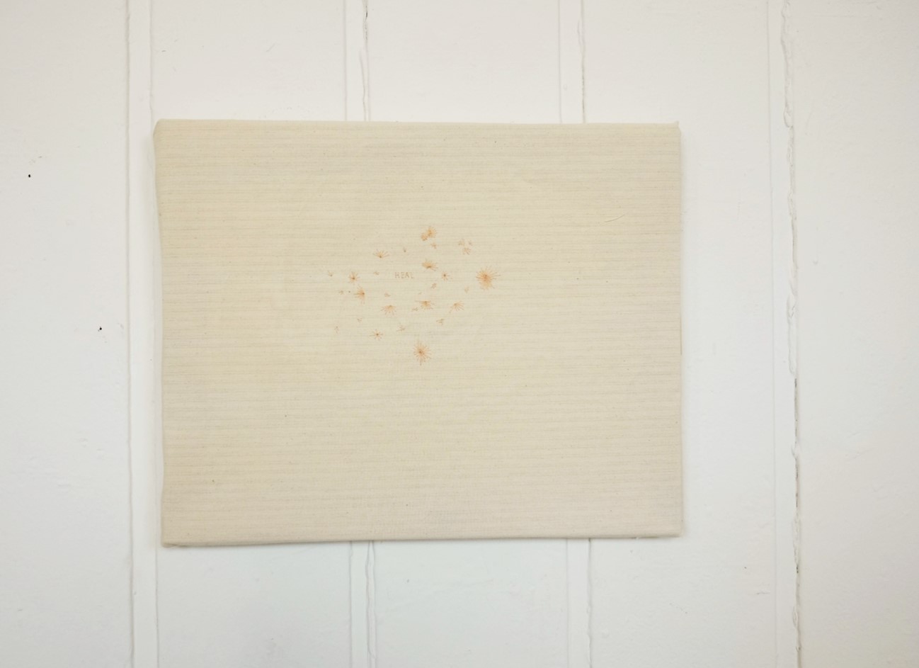 showing the subtle but visible signs of healed scaring.