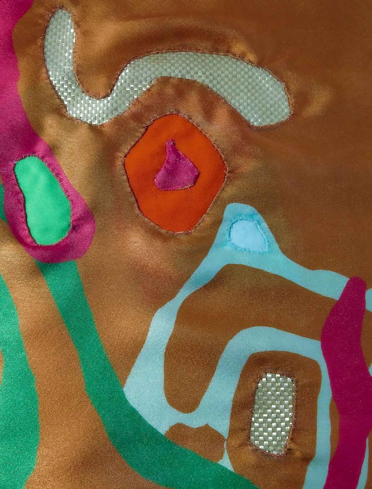 Handmade Mola made using Granada Print and layers of silk and Bulletproof fabric