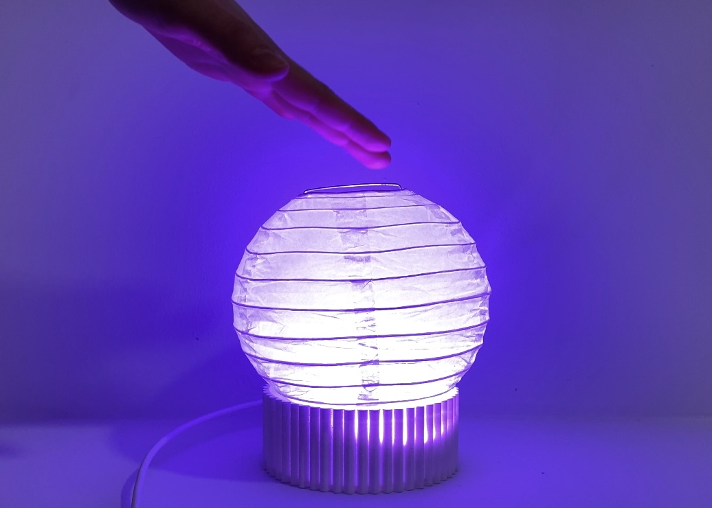 Lamp  A gesture sensor Lamp that sends different secret messages depending on the hand movement.