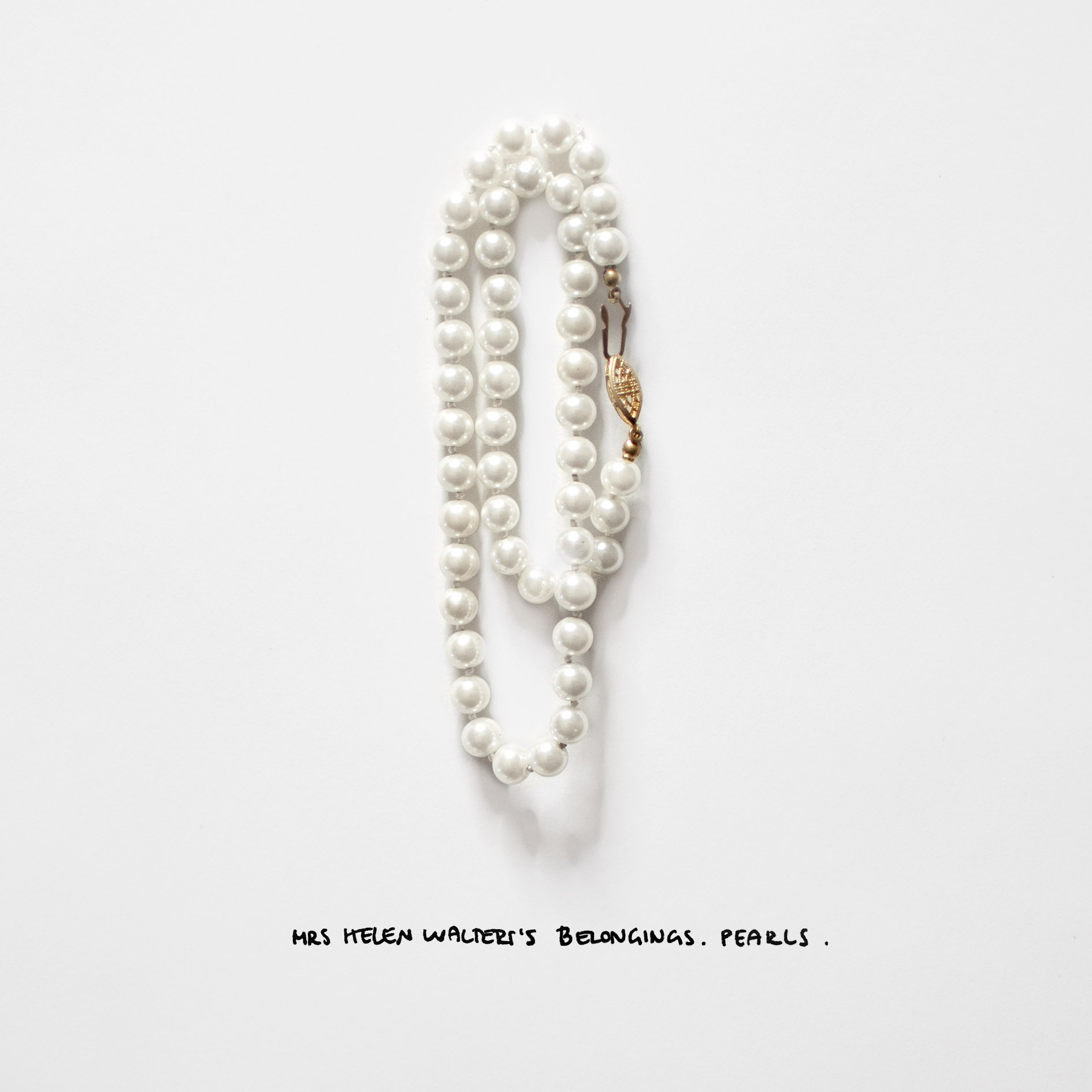 Mrs Helen Walters's belongings. Pearls.
