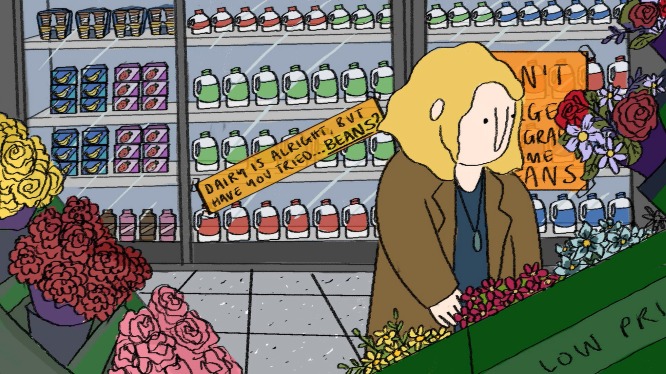 A screenshot from the film: A woman shops for flowers in the supermarket 