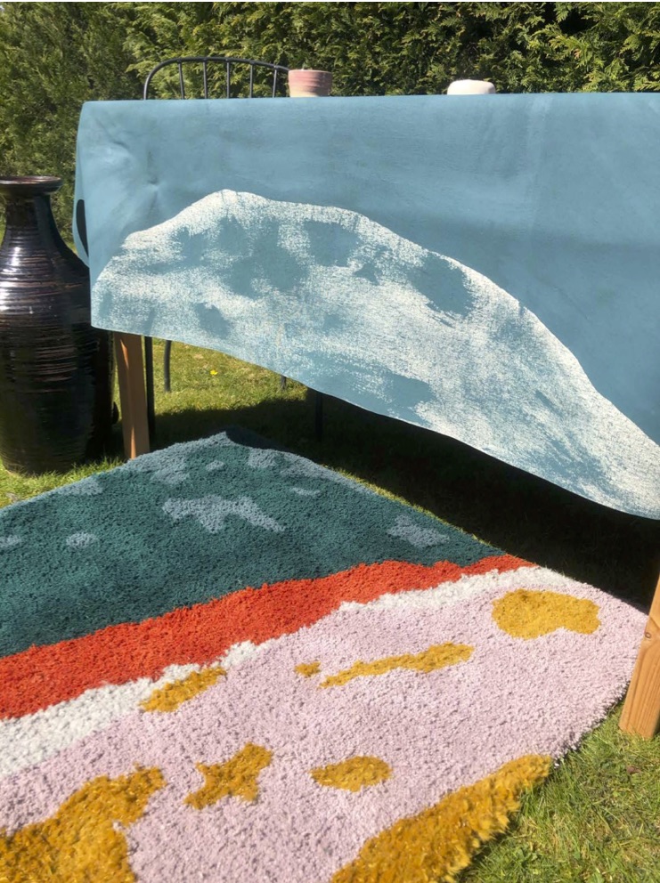 Textiles shown in an interiors setting.