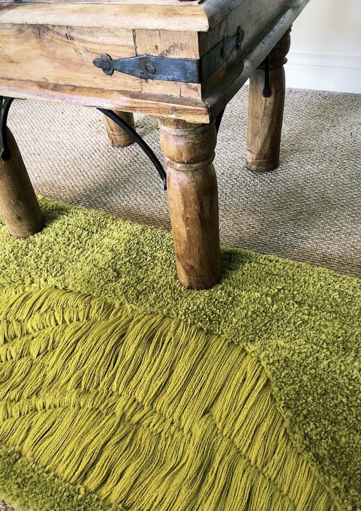 Textiles shown in an interiors setting.