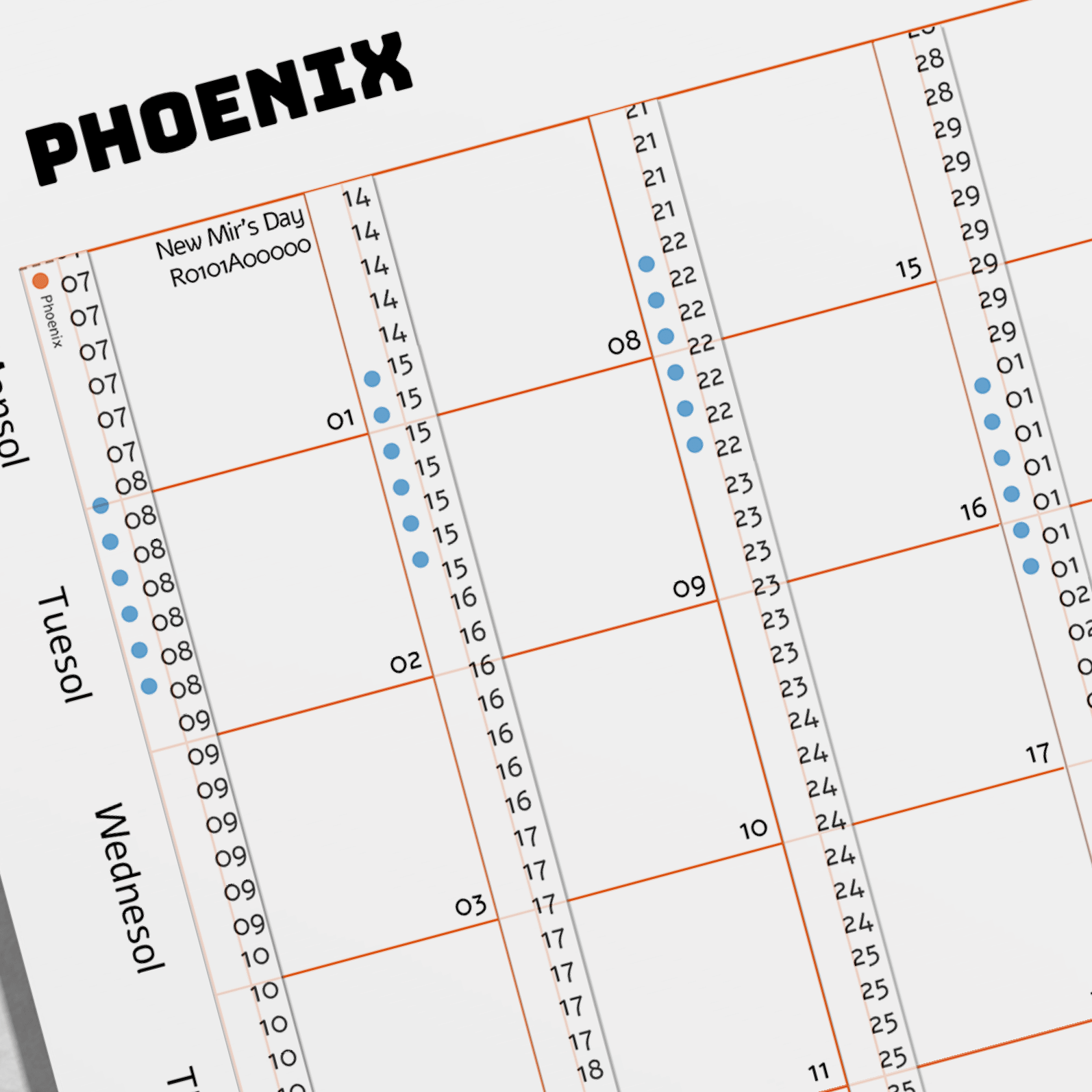 An orange coloured grid is offset, showing 12 blank squares. The word Phoenix can be read in the top left, and the words Tuesol and Wednesol in the bottom left. This is a close up of a calendar.
