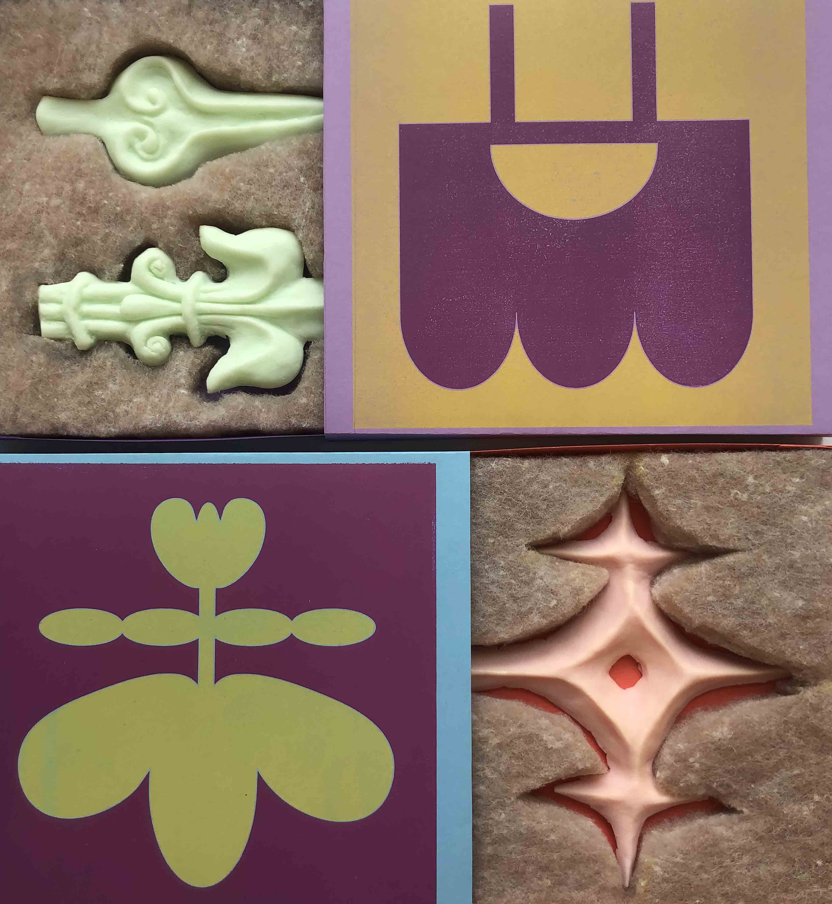 soaps nested into coloured card packaging, relief printed with floral motifs