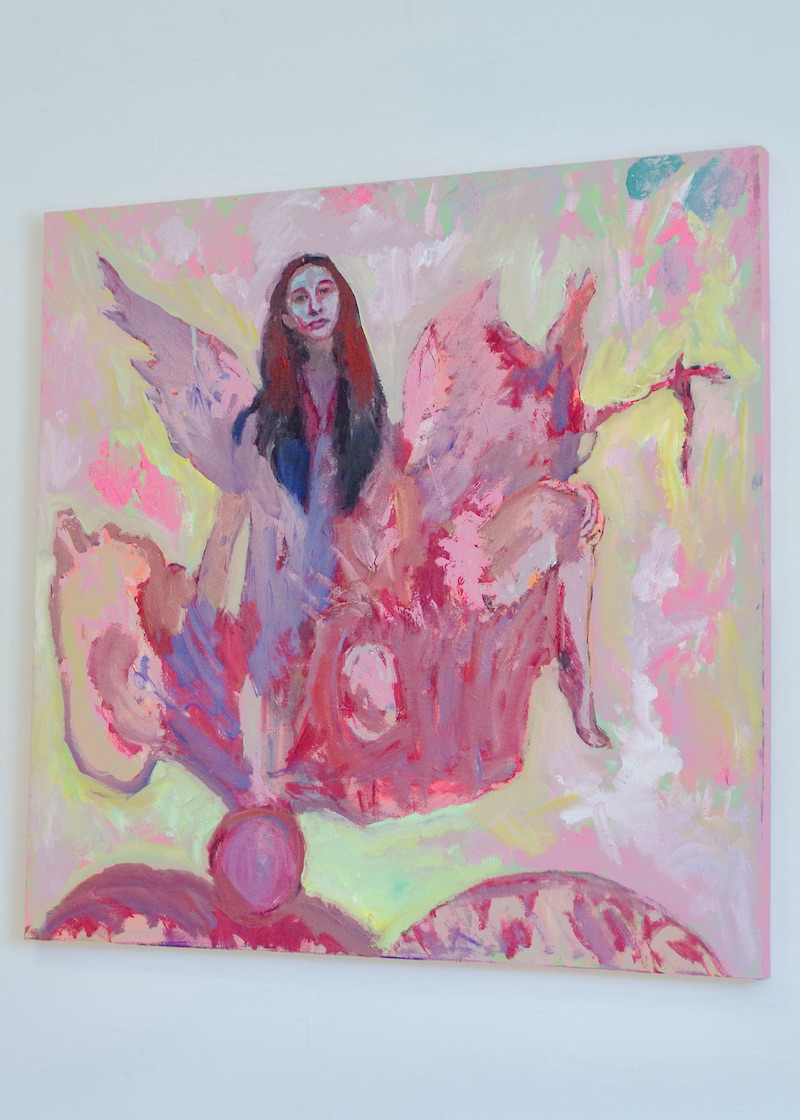 pink and yellow oil painting on wall depicting self portait of the artist as a mythological winged creature coming out of a vessel and birthing an egg