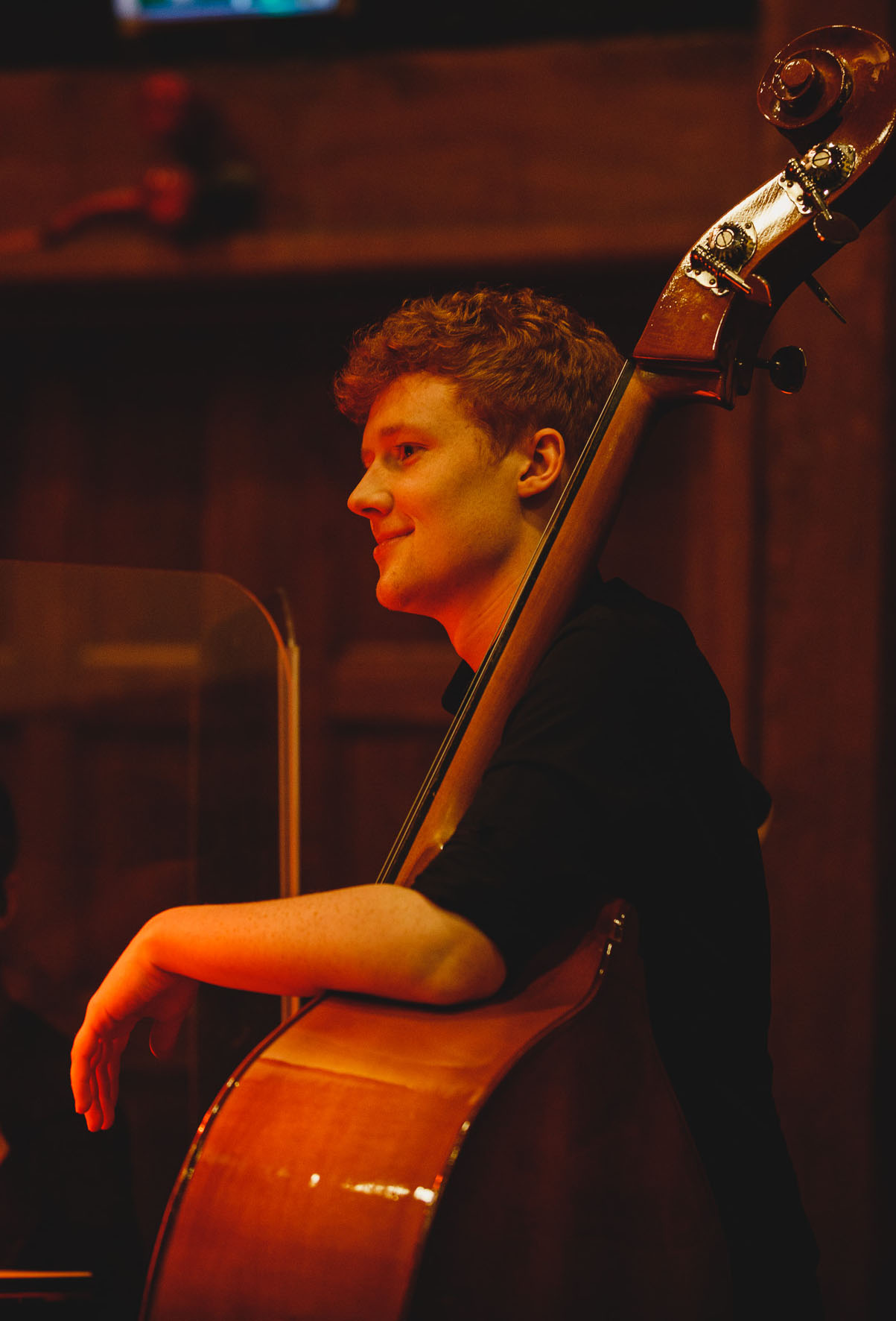 A picture of a man with a double bass.