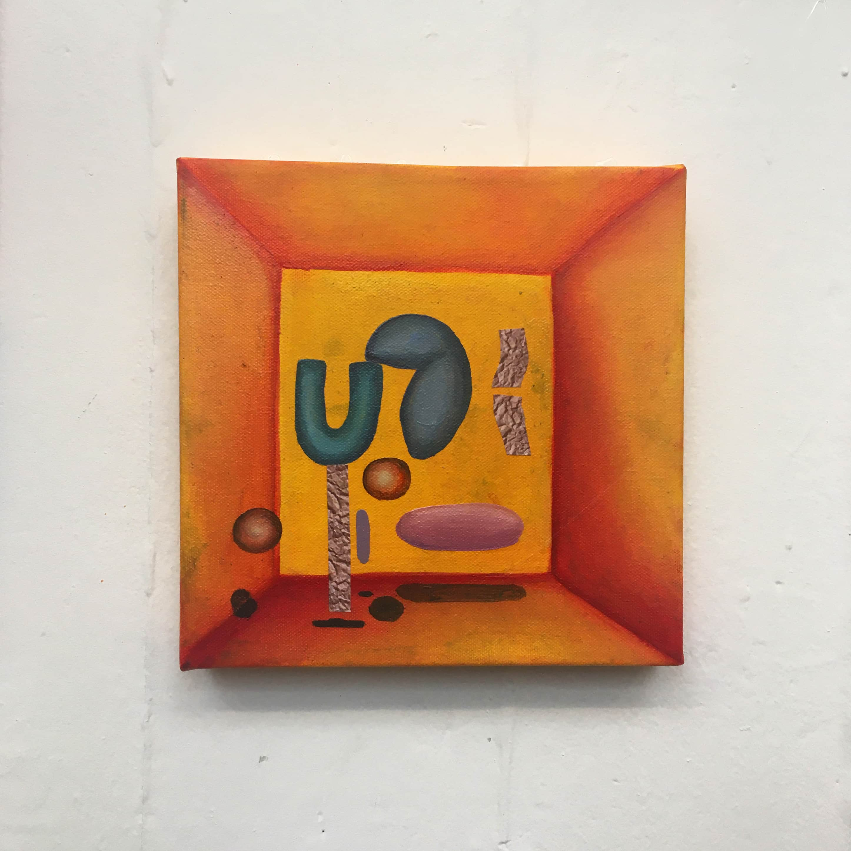 A painting of an orange/yellow room with odd blobs floating within. There are small strips of paper/sand texture around the blobs.