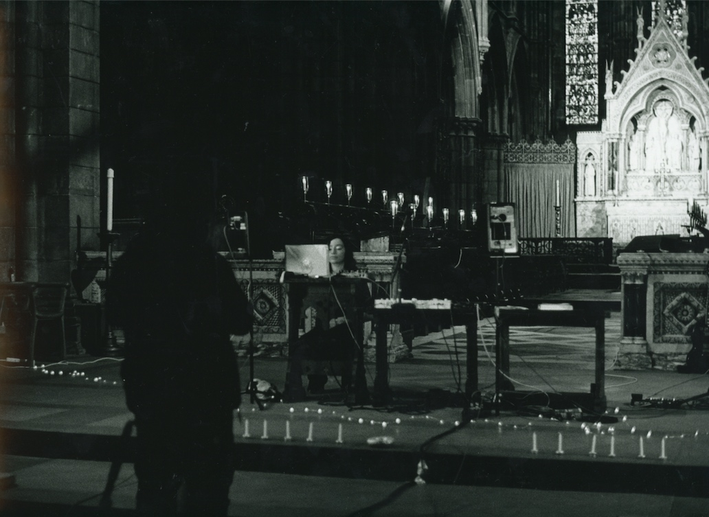 Alliyah performing her live set in the cathedral