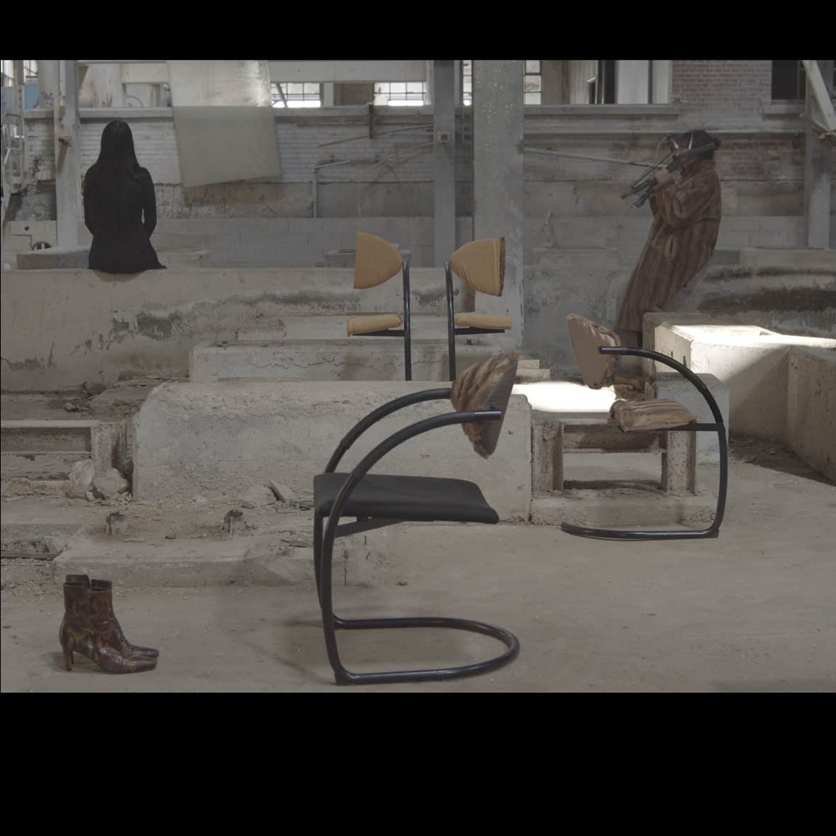 L'usine MF. Still of a filmed scenography, France, April 2021. Whipped cream, snake boot, horse statue, vertical blinds, pork trotter, tennis towel.