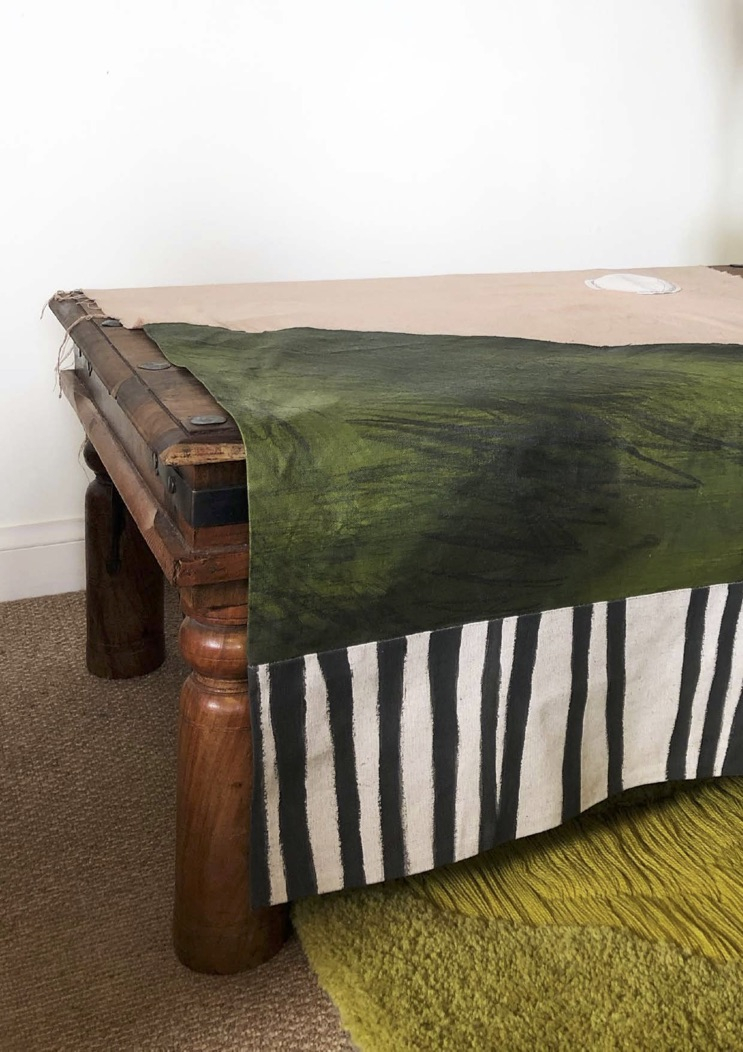 Textiles shown in an interiors setting.