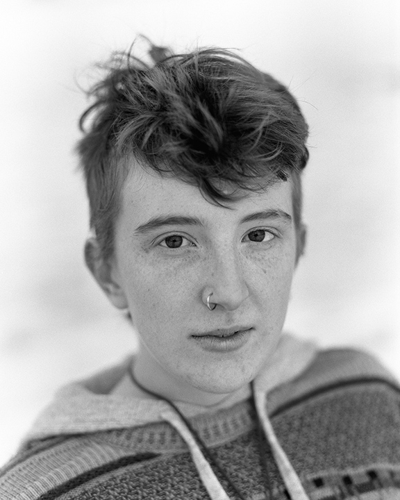 Portrait of a young man in black and white