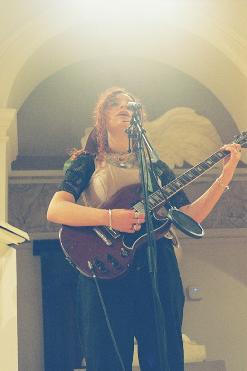 alliyah playing guitar