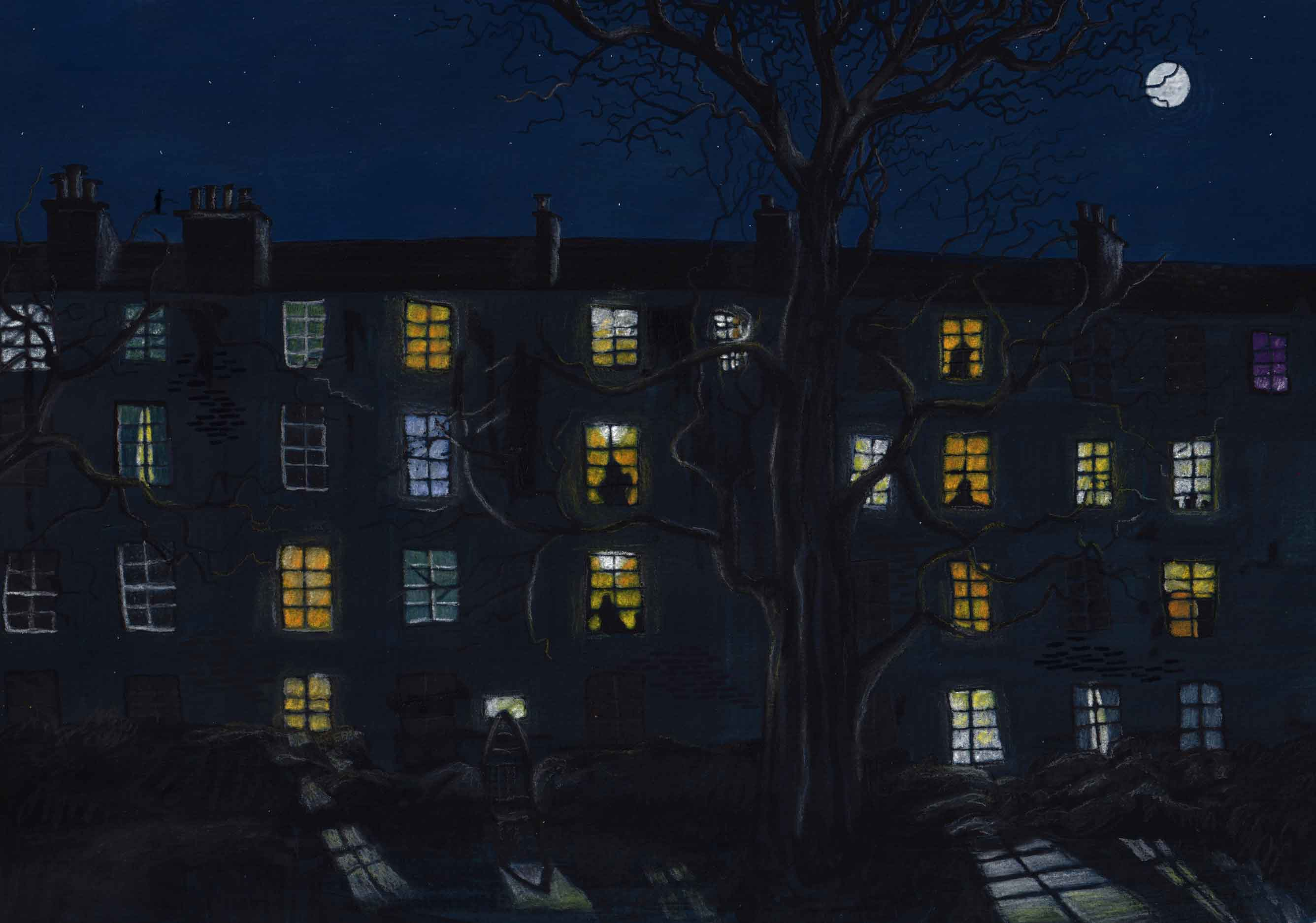 A building with lights in the windows at night. The sky is dark and the moon is up.