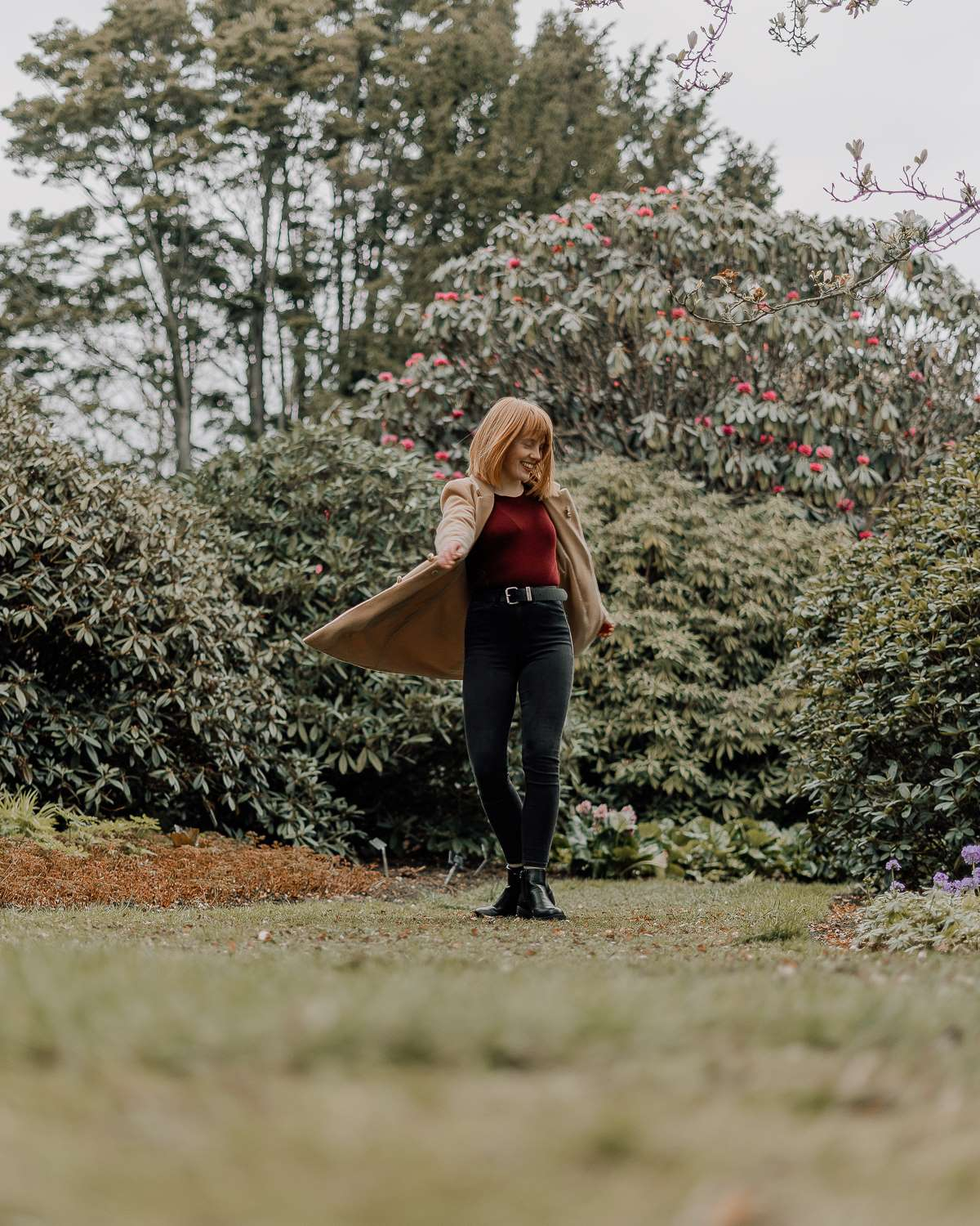 Red haired girl in the Edinburgh Botanic Gardens