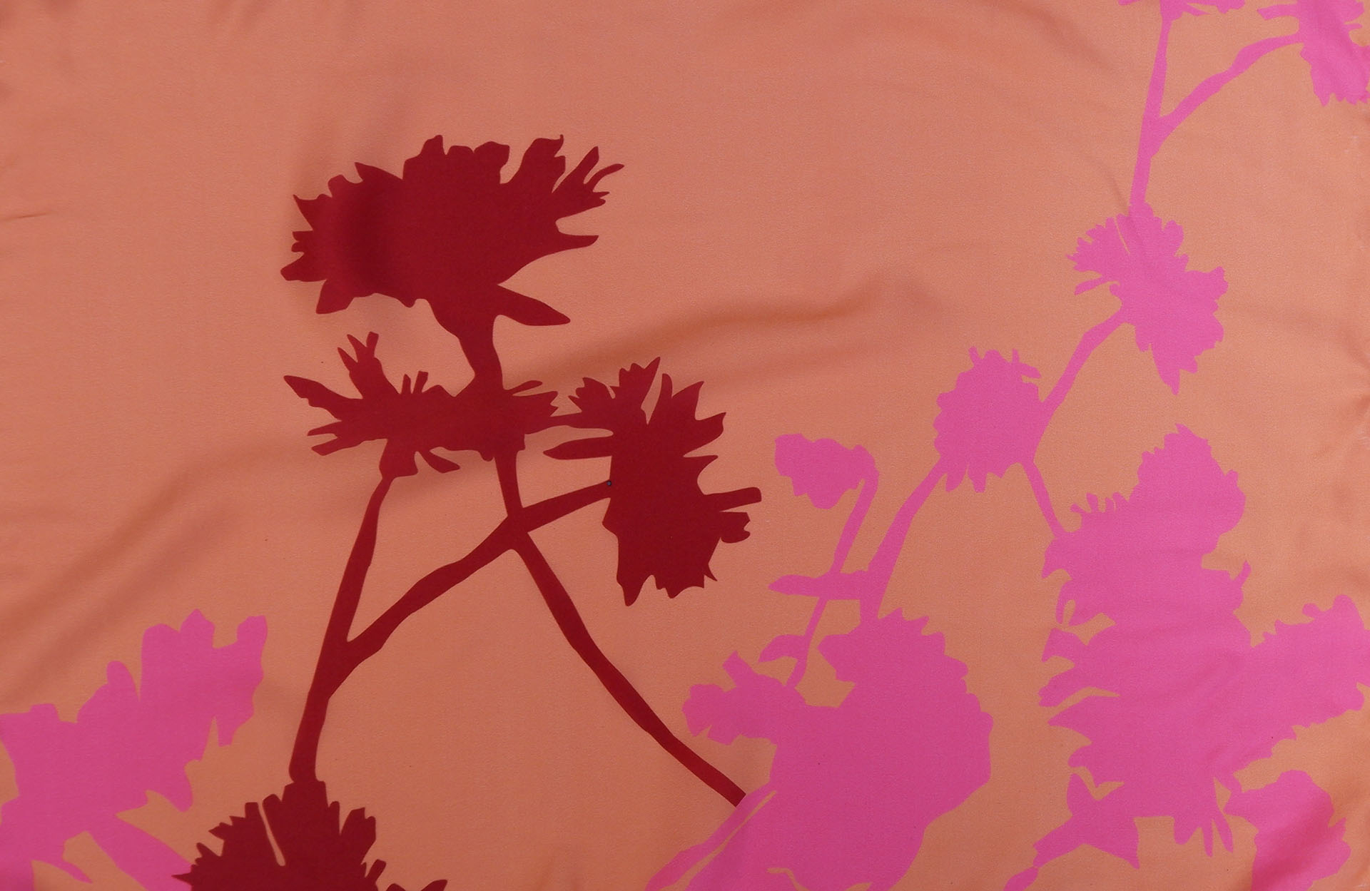 This image shows a sample from my collection. This sample was inspired by floral shadows and has been digitally printed onto silk.