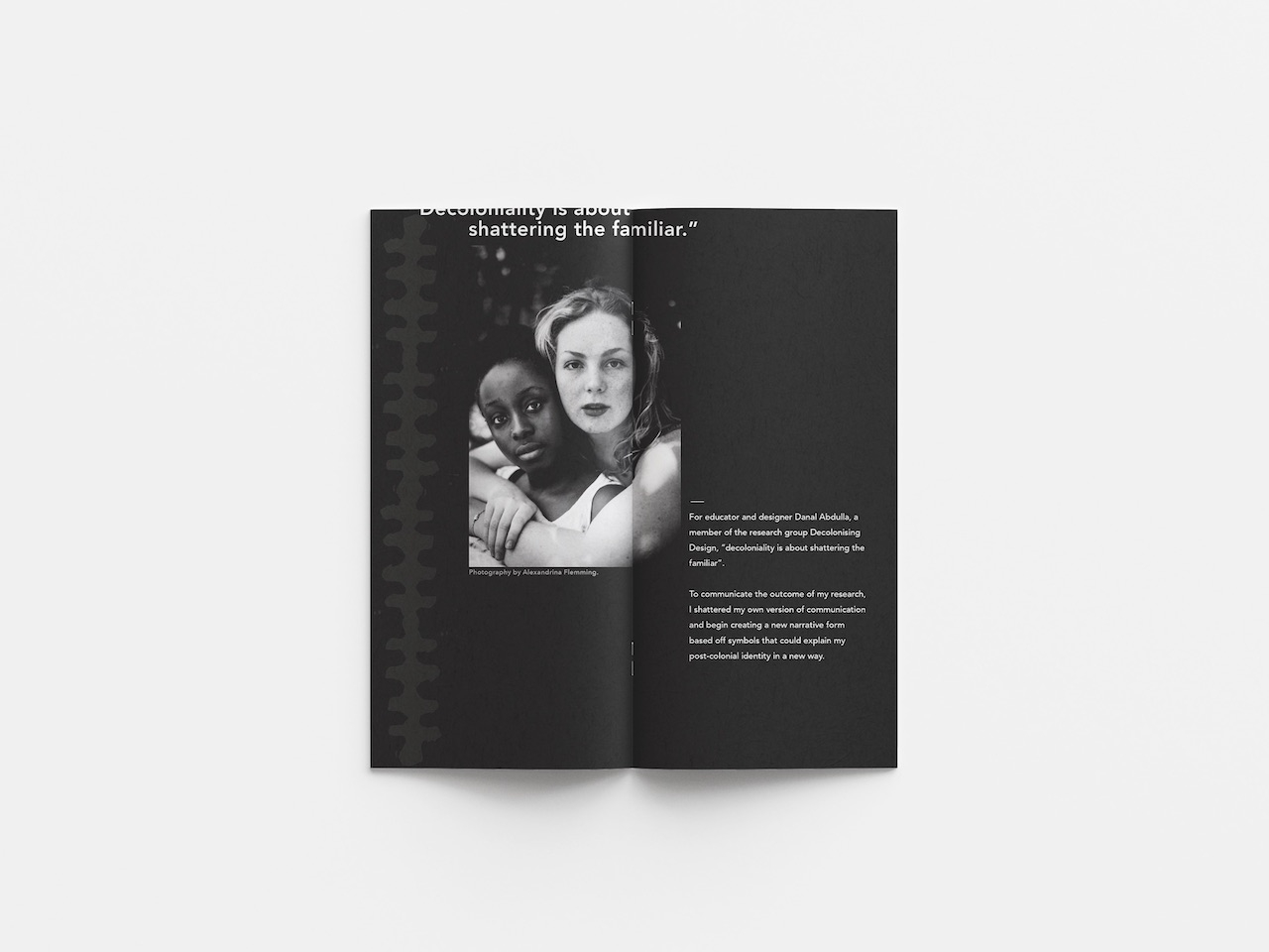 Accompanying exhibition publication displaying black and white imagery and text