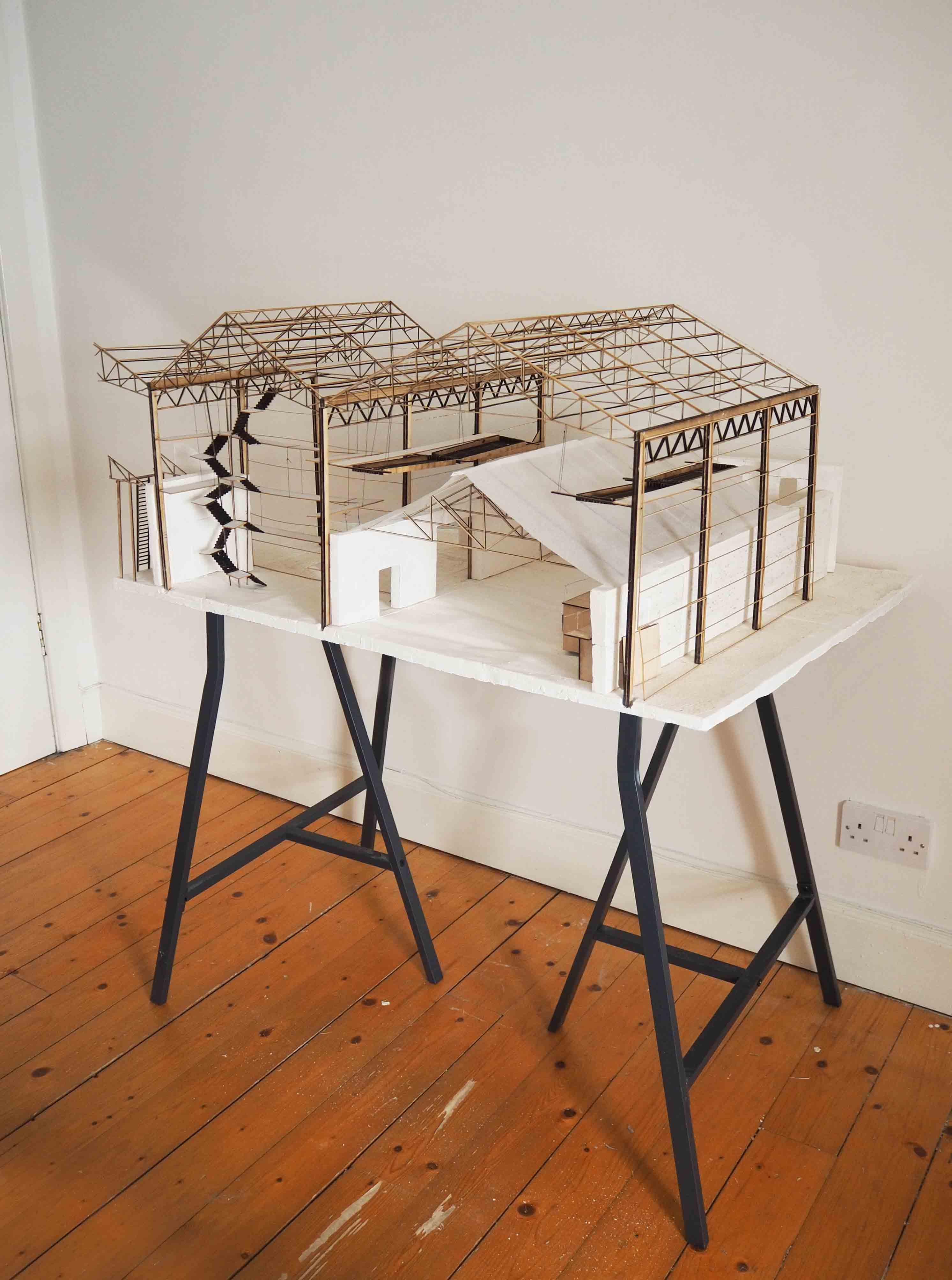 Model made of plaster cast and laser cut plywood elements, showing a section of a glasshouse design proposal in Leith.